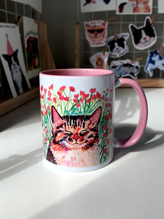 Handmade illustrated gift items including mugs, art prints, and cards created by a local artist in Wageningen — displayed in a bright, cheerful setting.