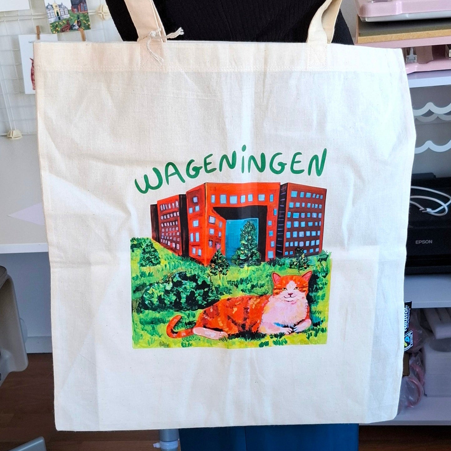 Wageningen organic cotton tote bag with Forum University Building and orange cat design
