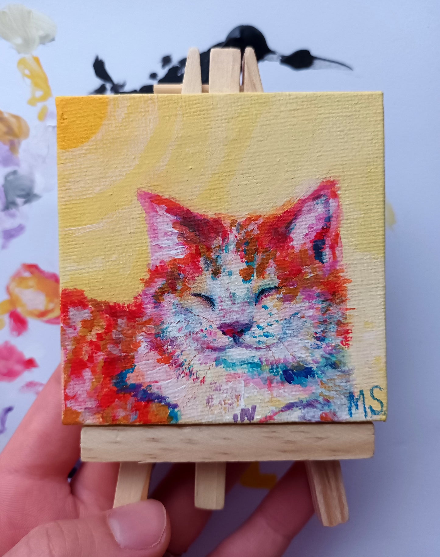 Hand-painted custom mini pet portrait on a tiny 7x7 cm canvas, includes a wooden easel for display, perfect personalised gift for pet lovers, a cat in the sun