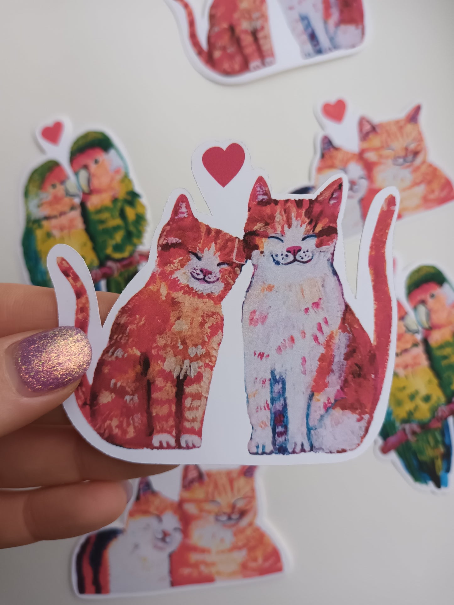 Romantic full-body cats in love sticker, hand-drawn illustration, waterproof vinyl decal held by hand