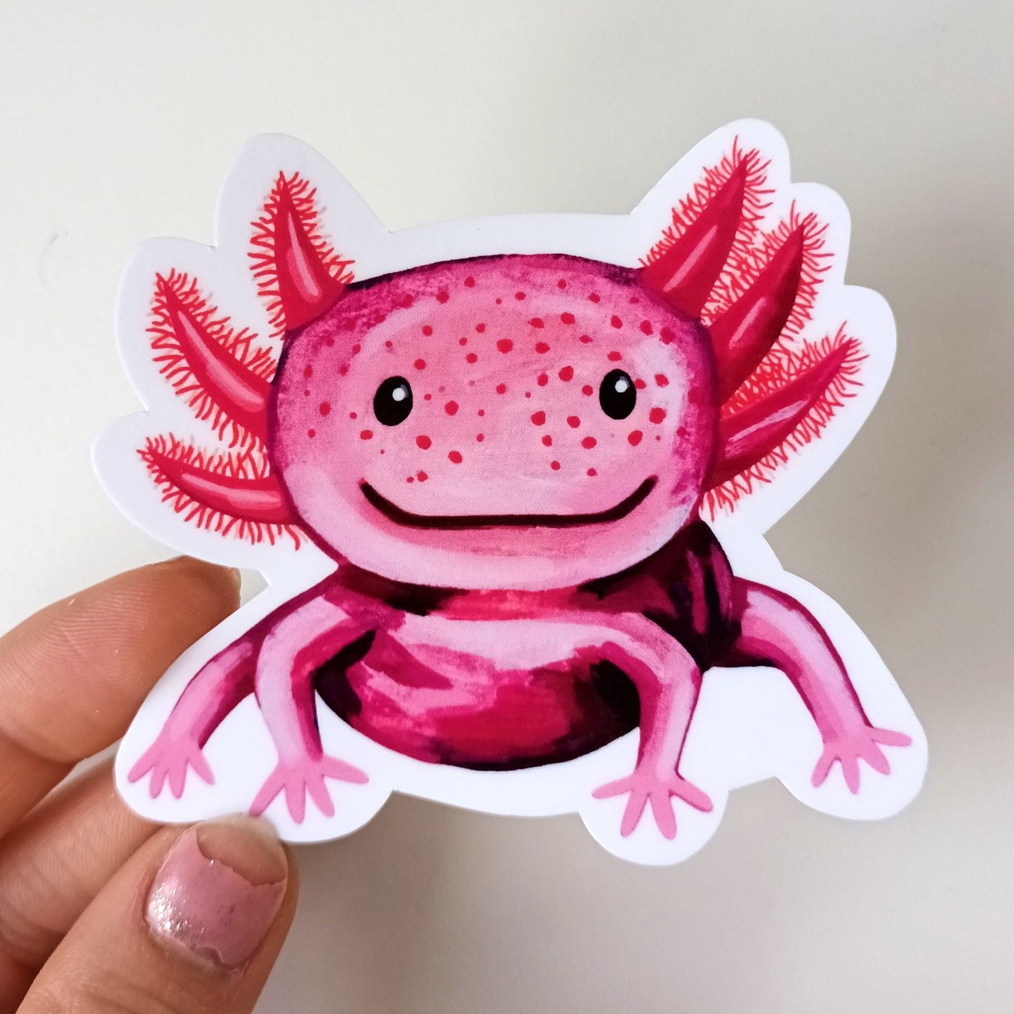Hand-painted pink axolotl vinyl sticker, waterproof and scratch-resistant, approx. 7.5 x 6.8 cm, perfect for decorating personal items held by hand