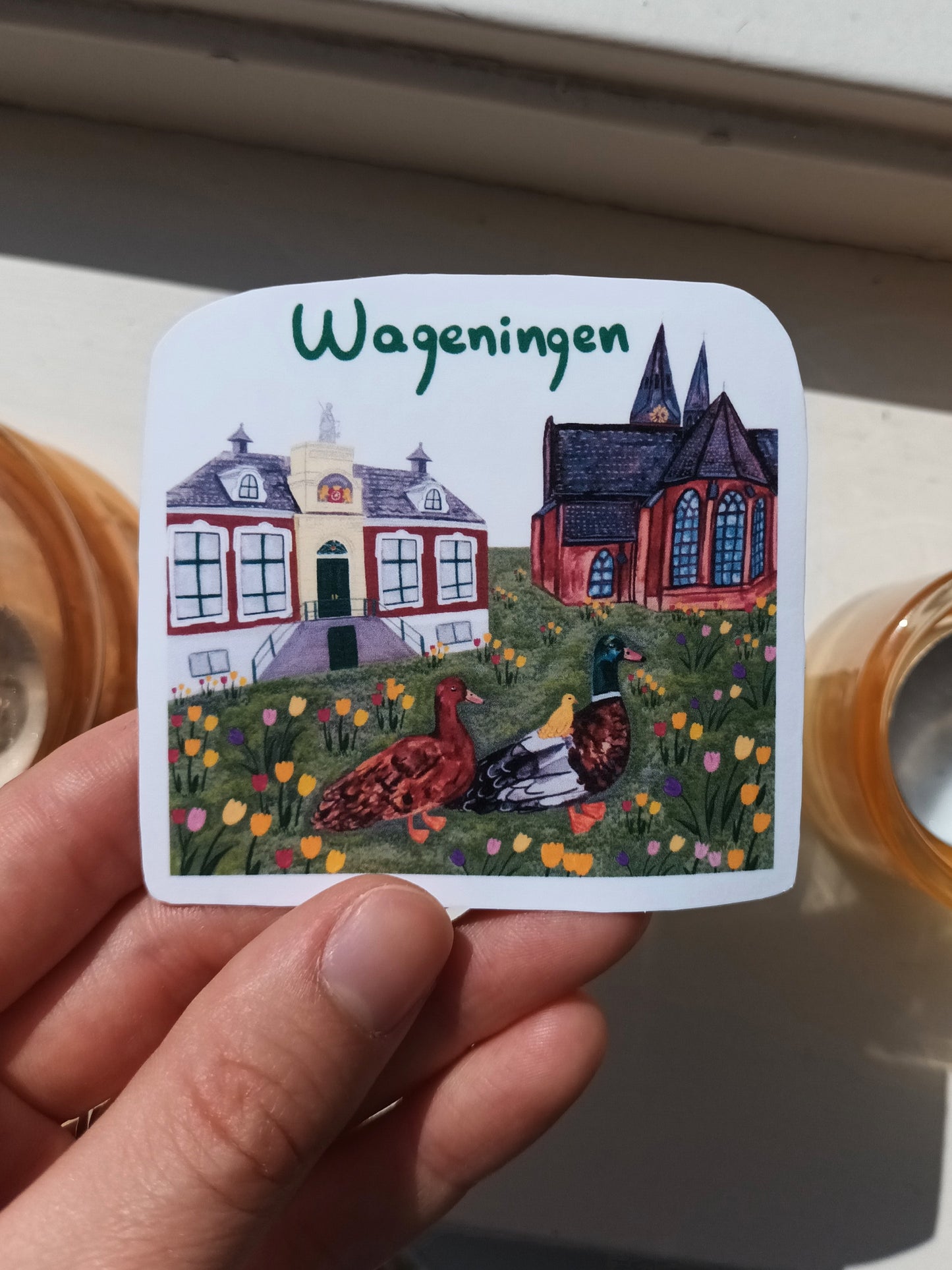 Wageningen sticker with church, municipality, tulips & duck family