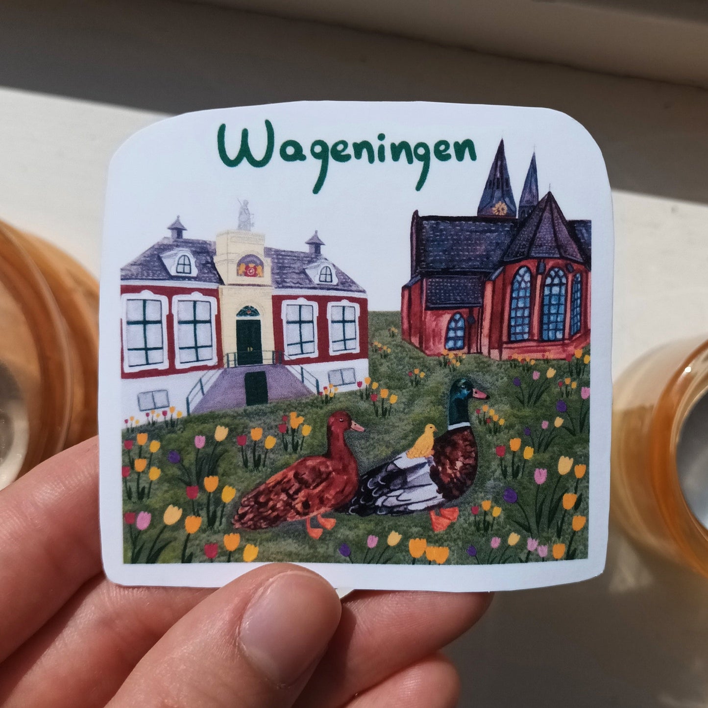 Wageningen sticker with church, municipality, tulips & duck family