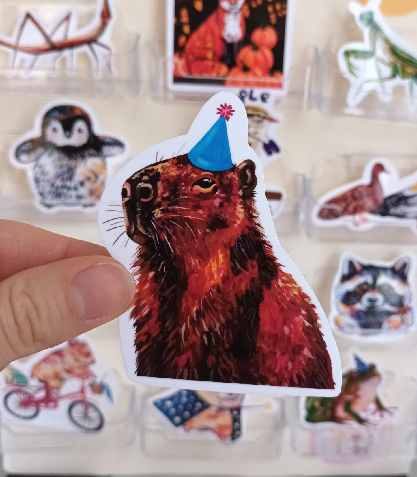 Cute capybara party sticker wearing colourful hat