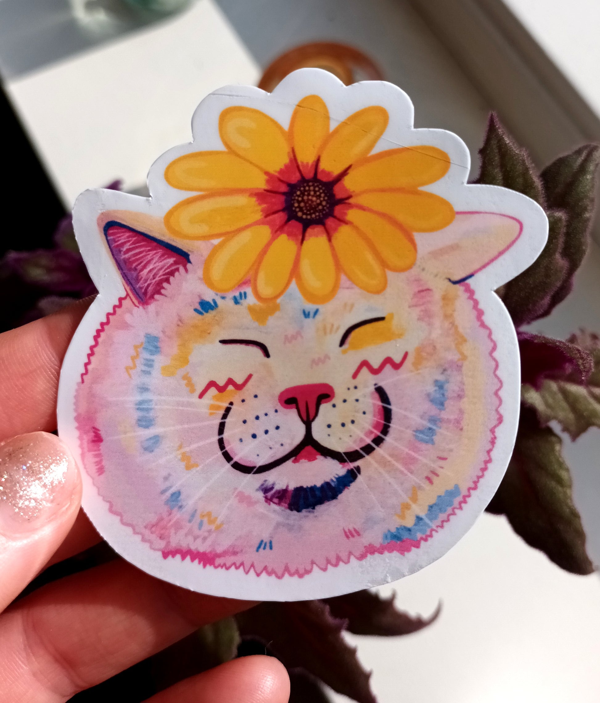 Cute white cat sticker with a pink flower, hand-painted vinyl design, approximately 7 x 7.54 cm, waterproof and handmade held by hand