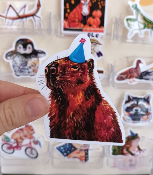 Cute capybara party sticker wearing colourful hat