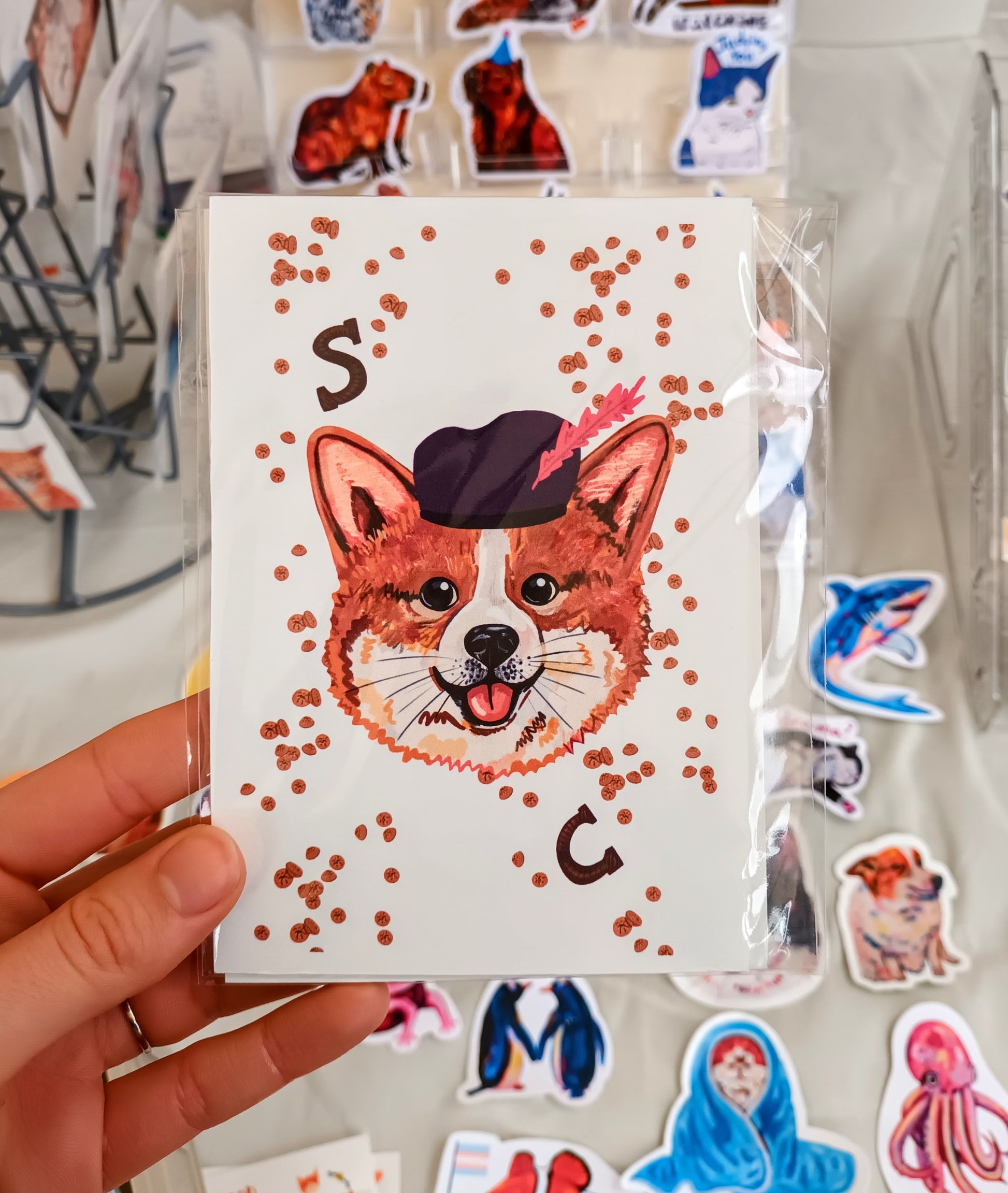 Handmade corgi postcard featuring a cute festive corgi dressed as a Sinterklaas helper, printed on eco-friendly paper.
