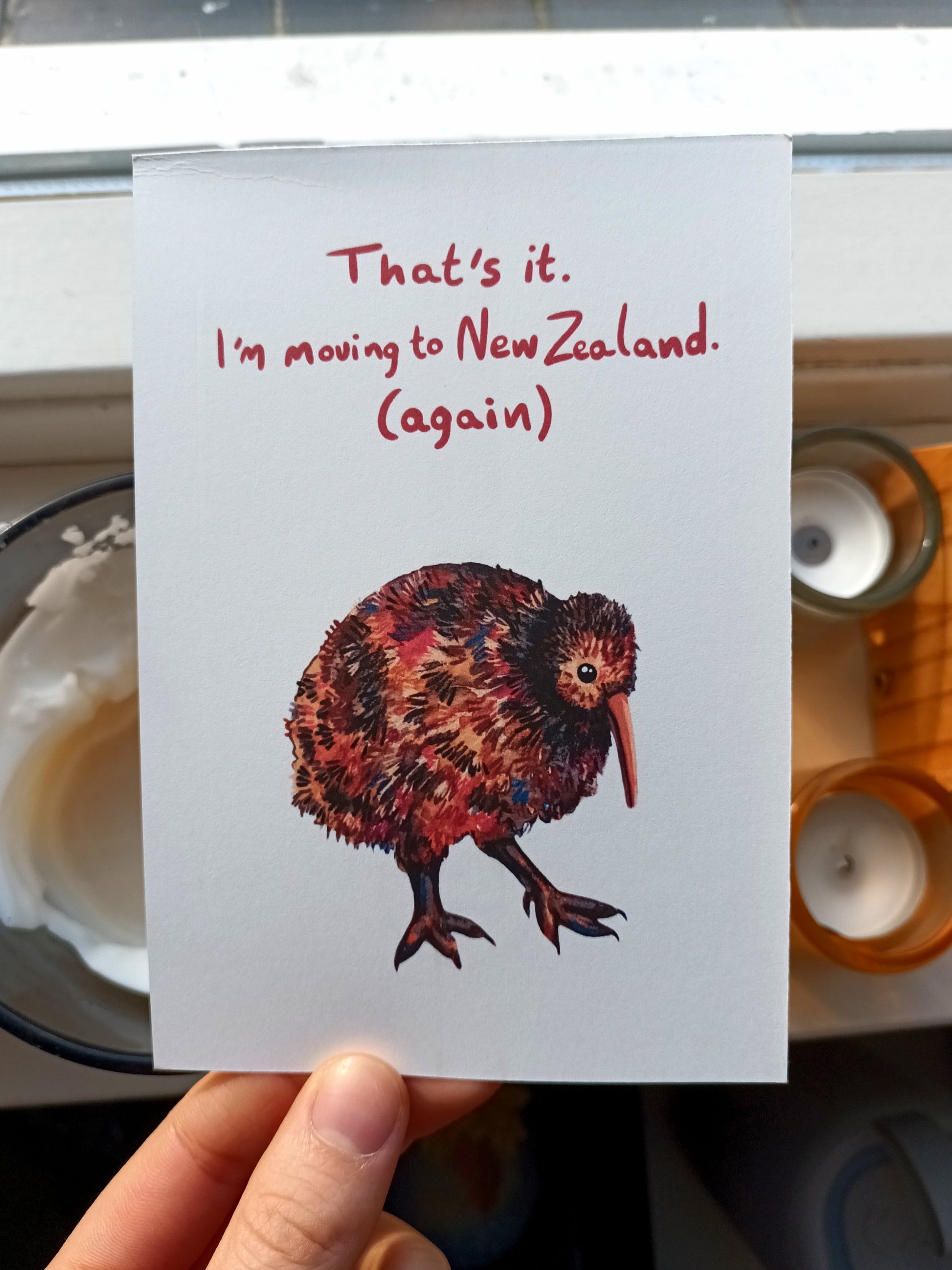 Moving Kiwi postcard with “I’m moving to New Zealand (again)” text, original illustration by the artist