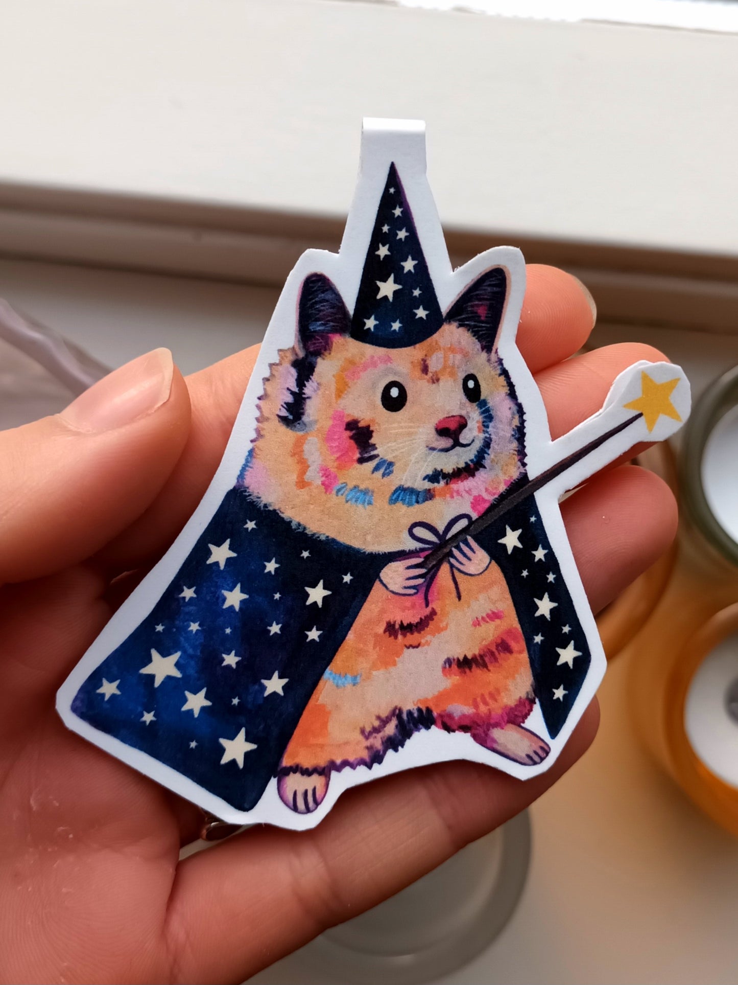 Cute handmade magnetic bookmark with a colourful illustration of a hamster magician wearing a hat and holding a wand – perfect for readers and book lover