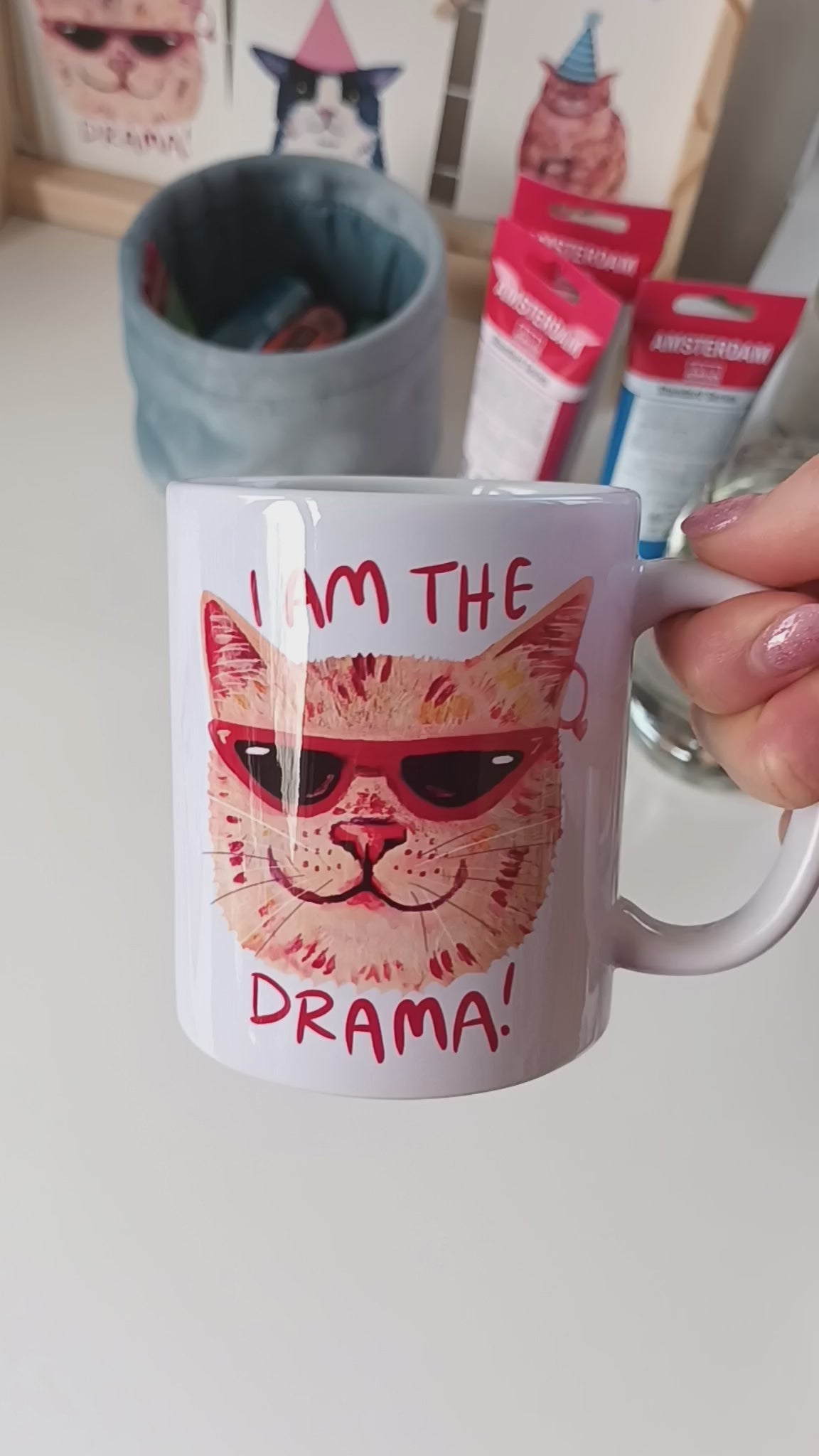 Handmade ceramic mug featuring a dramatic cat design with the text 'I am the Drama Cat', perfect for coffee, tea, or hot chocolate video